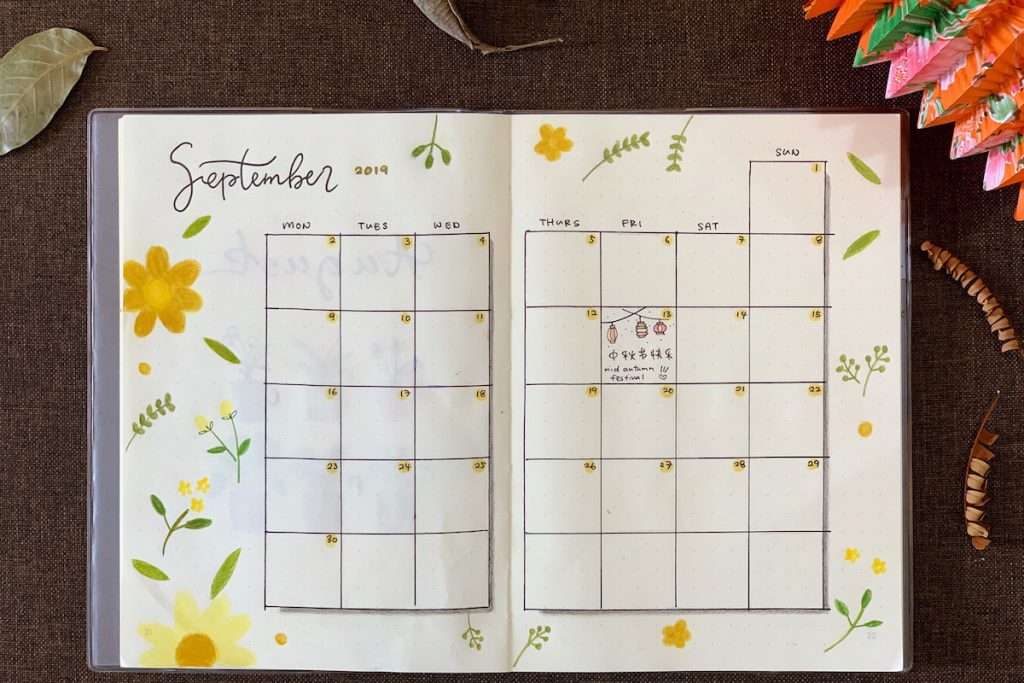 bullet journal showing calendar on both pages